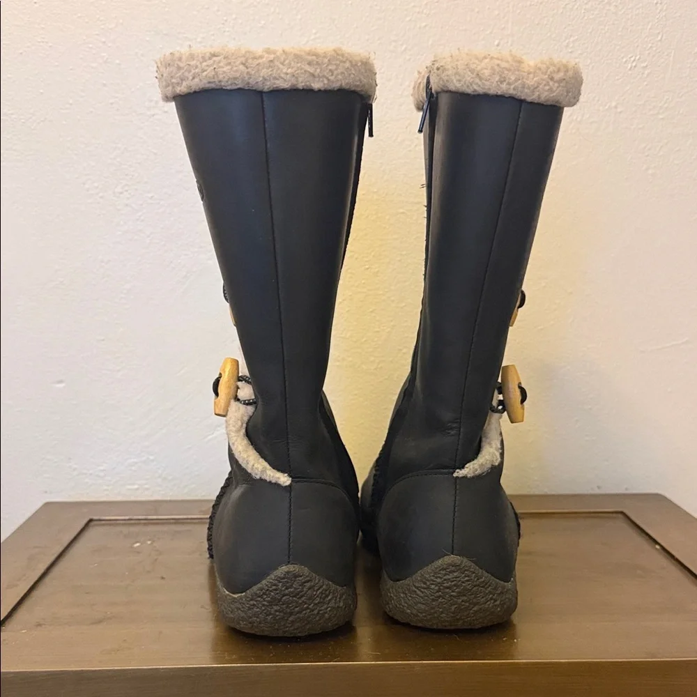 Black Shearling-Trim Winter Boots with Toggle Accents